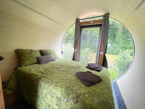 Voodi või voodid majutusasutuse Eco-lodge locatie De Boergondier toas
