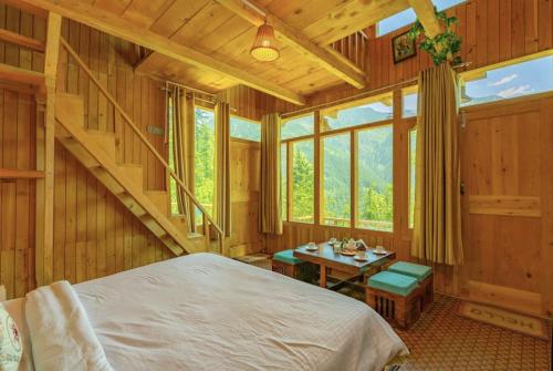 Ένα ή περισσότερα κρεβάτια σε δωμάτιο στο Sunrise Farm Stays