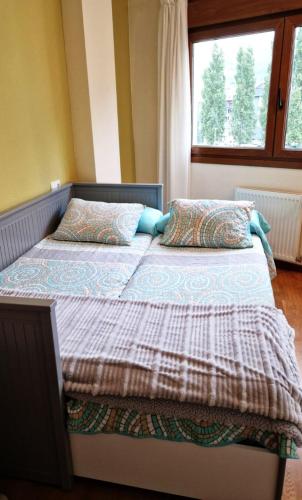Ένα ή περισσότερα κρεβάτια σε δωμάτιο στο Apartamento Ría Villaviciosa