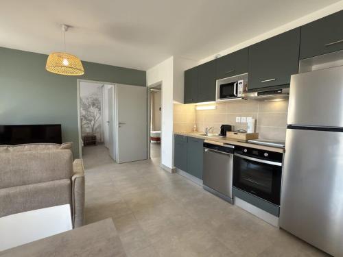 Photo de la galerie de l'établissement Valras-Loc Naia cosy avec piscine, à Valras-Plage