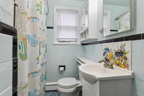 a bathroom with a sink and a toilet at 307 E Crocus Rd, Unit B in Wildwood Crest