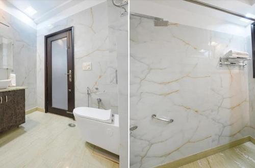 Un baño de Hotel GreySky Residency