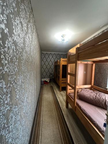 Postel nebo postele na pokoji v ubytování Welcome 24 Mukachevo