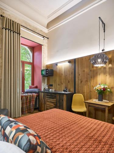 Postel nebo postele na pokoji v ubytování WOOD Design Aparthotel