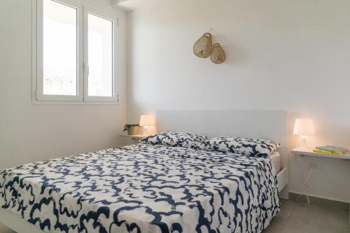 En eller flere senge i et værelse på GuestHost - Borgo 84 Marzamemi - Angolo sul Mare