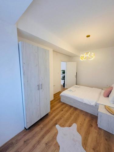 Postel nebo postele na pokoji v ubytování Mango Apartments