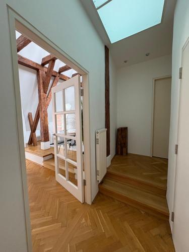 an open room with a skylight in a house at Danube Holiday Homes Top 6 in Krems an der Donau
