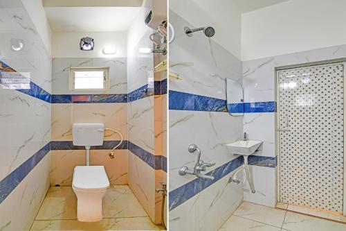 a bathroom with a toilet and a shower and a sink at FabHotel BN Palace - Near Belgharia expressway in kolkata