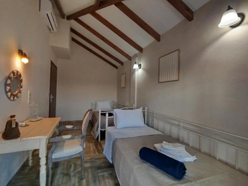 Postel nebo postele na pokoji v ubytování Anemona Villa