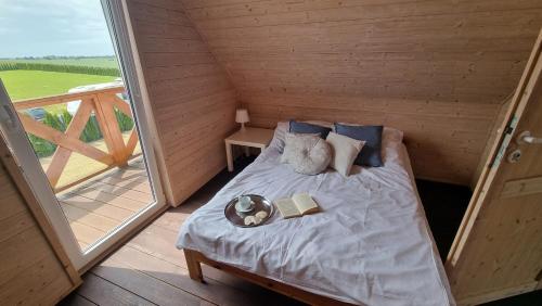 Postel nebo postele na pokoji v ubytování Domki Białe Zacisze