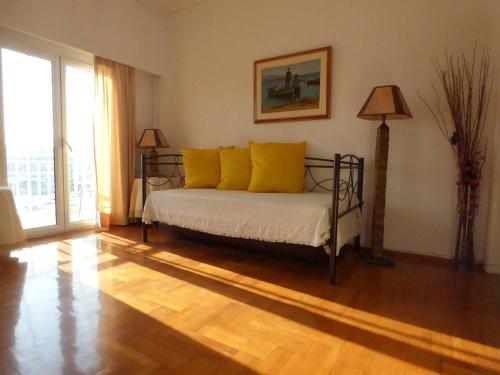 Ένα ή περισσότερα κρεβάτια σε δωμάτιο στο Serenity View Apartment - Marina Zeas
