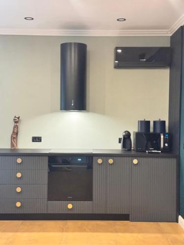 Dapur atau dapur kecil di SSN Apartment