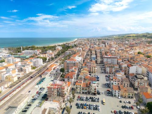 an aerial view of a city with the ocean at Virginia Madre Luxury Rooms in San Benedetto del Tronto