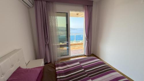 Katil atau katil-katil dalam bilik di VISTA Kalamper MONTENEGRO