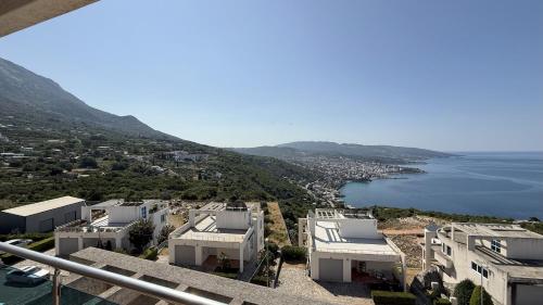an aerial view of houses and the water at VISTA Kalamper MONTENEGRO in Dobra Voda