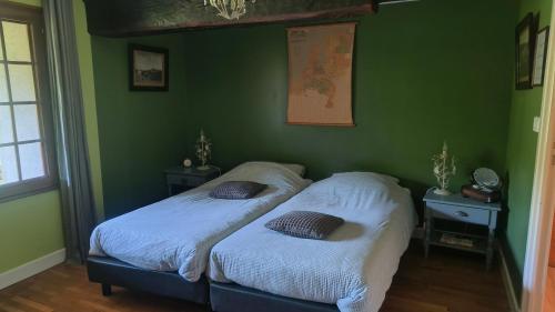 Postel nebo postele na pokoji v ubytování Le Mas Bellanger