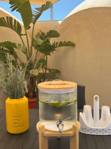 a fish in a fish tank on a table at Nausicaa Guesthouse in Marsala