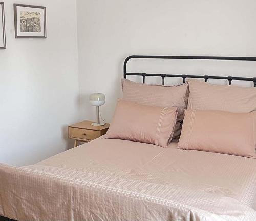 Una cama o camas en una habitación de Apartmány Žlutý dům