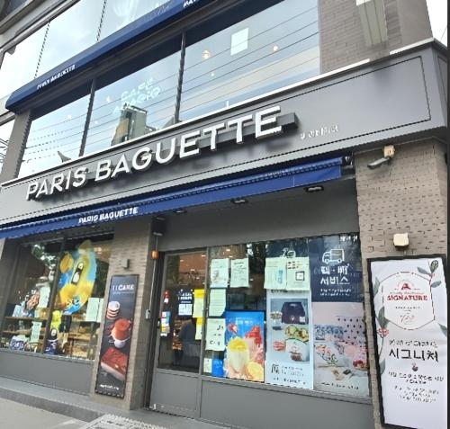 a store front of a paris bag store at stayaroma in Seoul