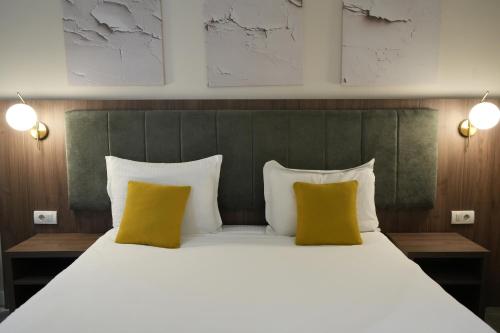 Cama o camas de una habitación en Hotel Bohemian Garni - Skadarlija