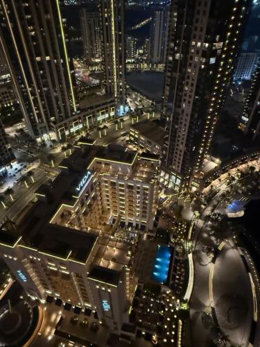 an aerial view of a city at night at 3403!Dubai SkyLine View! Royal Montania Homes in Dubai