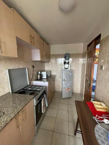 Una cocina o cocineta en Snugstay