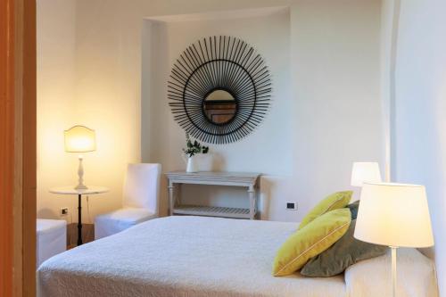 Cama o camas de una habitación en Nettuno Gamberaia Apartments