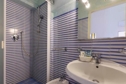 Un baño de Nettuno Gamberaia Apartments