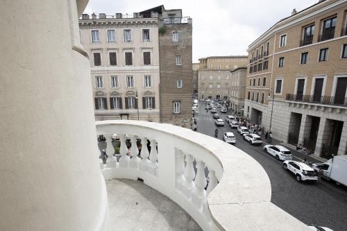 a view of a city street with cars on the road at Antica Dimora Delle Cinque Lune in Rome
