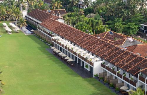 an aerial view of a resort with green lawn at EKHO Surf Bentota in Bentota