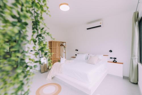 Katil atau katil-katil dalam bilik di Breath of Paradise Villa