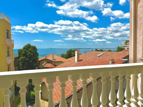 a balcony with a view of the ocean at Aqua Studio - Sveti Vlas in Sveti Vlas