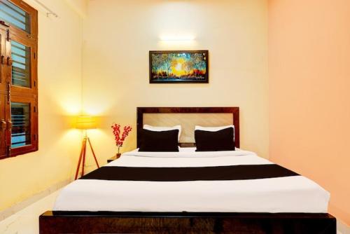Postel nebo postele na pokoji v ubytování Hotel Royal Residency