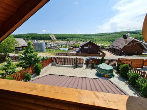 an aerial view of a backyard with a playground at Cabana Giulia in Beclean