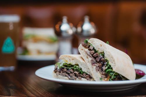 a sandwich on a plate on a table at The Royal Sutton in Sutton Coldfield