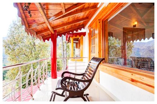 Balkón nebo terasa v ubytování Boost Go Resort Peach-wood Nainital