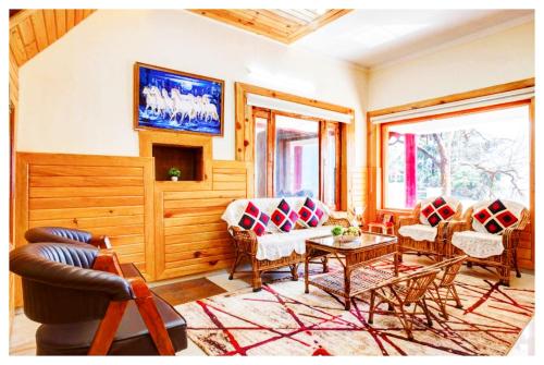 Posezení v ubytování Boost Go Resort Peach-wood Nainital