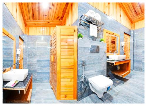 Koupelna v ubytování Boost Go Resort Peach-wood Nainital