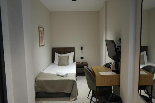 Cama o camas de una habitación en Hotel Bohemian Garni - Skadarlija