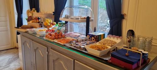 a buffet of food on top of a counter at Chateau de l Aviette - Rancennes in Givet