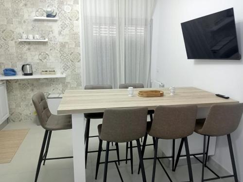 TV a/nebo společenská místnost v ubytování Nerea Apartment