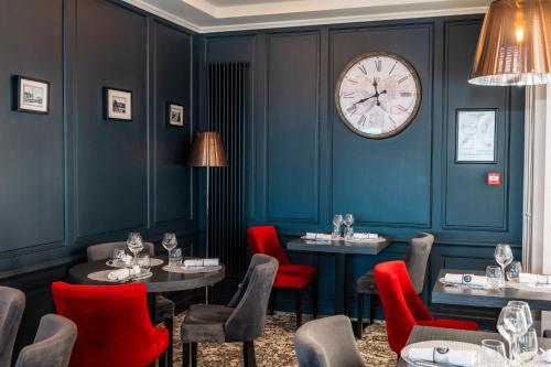Et opholdsområde på Le Grand Hôtel de la Marine "face à la mer"