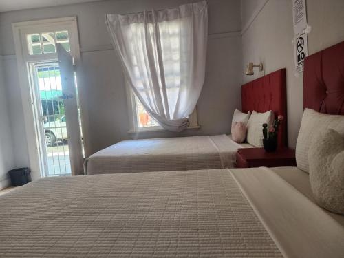 Katil atau katil-katil dalam bilik di Kudu Guest House