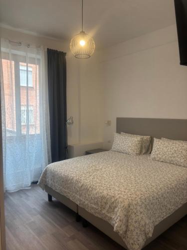 Postel nebo postele na pokoji v ubytování PORTA FURBA Suites