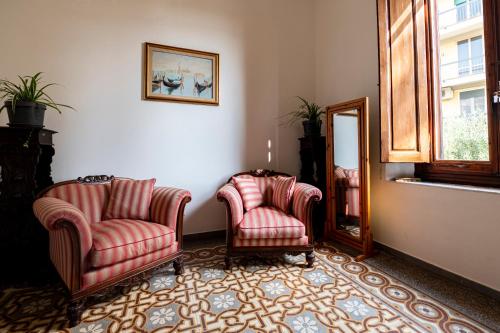 Posezení v ubytování Villa dell'Artista - Camere con bagno privato in Villa storica
