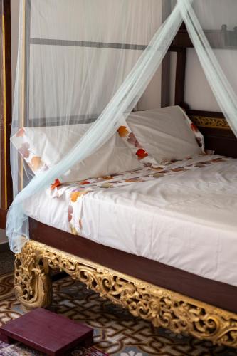 Postel nebo postele na pokoji v ubytování Villa dell'Artista - Camere con bagno privato in Villa storica