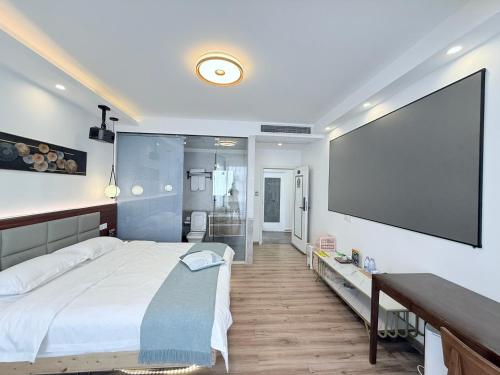 Ένα ή περισσότερα κρεβάτια σε δωμάτιο στο Find Her B&B