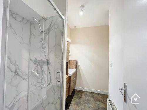 a bathroom with a shower and a sink at La Loggia - Premium apartment 60 m2 in Châtellerault