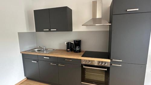 Η κουζίνα ή μικρή κουζίνα στο Ferienwohnung Siamblick