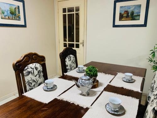 Area soggiorno di Casa Nina, com Piscina e Brinquedoteca, Super Próxima das Cataratas e Aeroporto